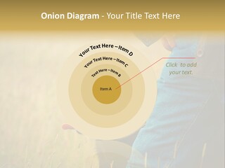 A Person Holding A Black Dog In A Field PowerPoint Template