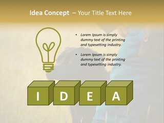 A Person Holding A Black Dog In A Field PowerPoint Template