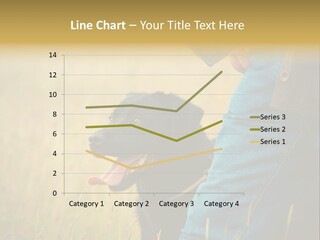 A Person Holding A Black Dog In A Field PowerPoint Template