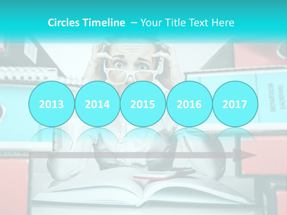 A Woman In Glasses Is Sitting At A Desk With Many Files PowerPoint Template