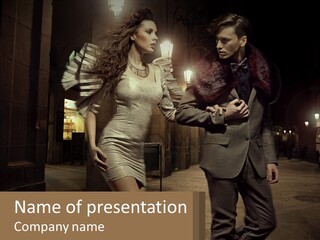 A Man And A Woman Walking Down A Street At Night PowerPoint Template
