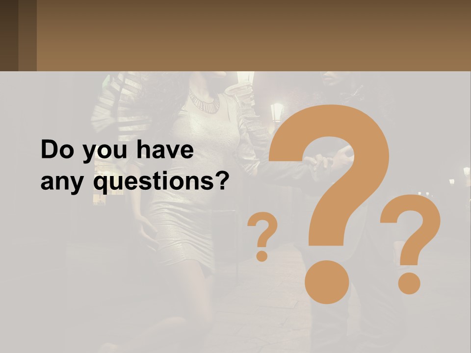 A Man And A Woman Walking Down A Street At Night PowerPoint Template