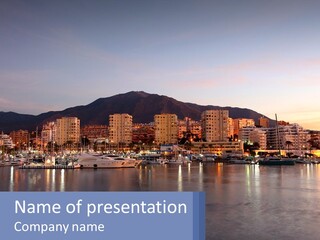 A Large Body Of Water With A City In The Background PowerPoint Template