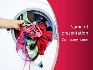 A Person Holding A Pile Of Clothes In A Washing Machine PowerPoint Template