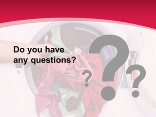 A Person Holding A Pile Of Clothes In A Washing Machine PowerPoint Template