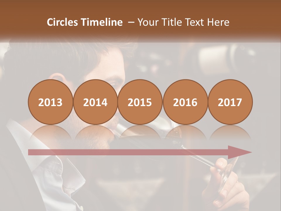 A Man Drinking A Glass Of Wine From A Wine Glass PowerPoint Template