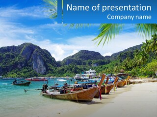 A Group Of Boats Sitting On Top Of A Sandy Beach PowerPoint Template