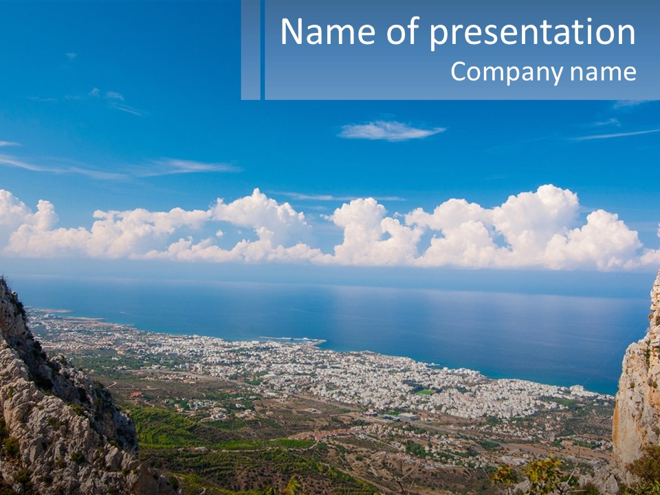 A Scenic View Of A City And The Ocean PowerPoint Template