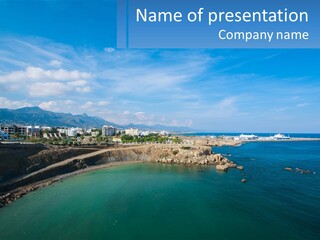 A Large Body Of Water With A City In The Background PowerPoint Template