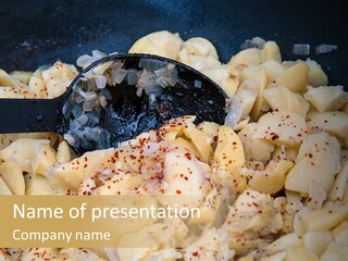 A Frying Pan Filled With Food With A Spoon PowerPoint Template