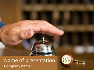 A Person Holding A Bell With A Wooden Base PowerPoint Template
