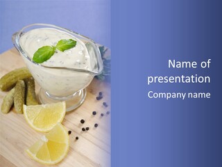 A Bowl Of Yogurt With Lemon Slices On A Cutting Board PowerPoint Template