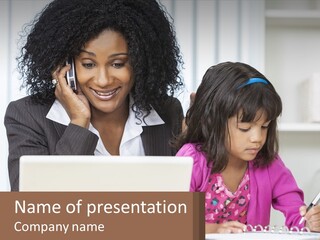 A Woman And A Little Girl Sitting At A Table In Front Of A Laptop Computer PowerPoint Template