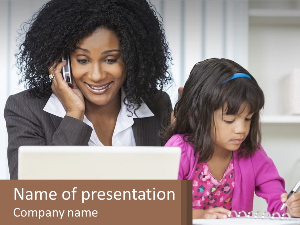 A Woman And A Little Girl Sitting At A Table In Front Of A Laptop Computer PowerPoint Template
