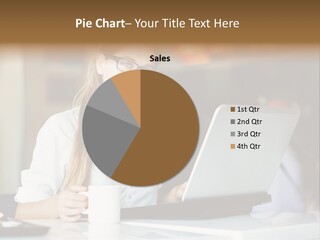 A Woman Sitting In Front Of A Laptop Computer PowerPoint Template