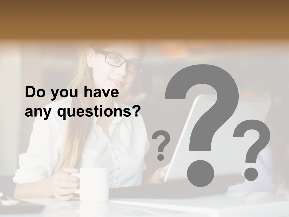 A Woman Sitting In Front Of A Laptop Computer PowerPoint Template