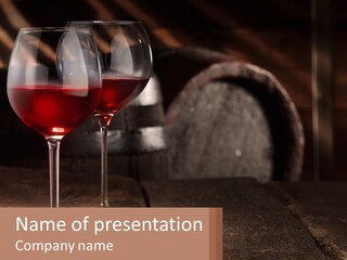 Two Glasses Of Red Wine On A Wooden Table PowerPoint Template