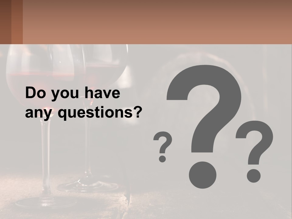 Two Glasses Of Red Wine On A Wooden Table PowerPoint Template