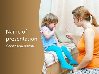 A Woman Sitting On A Bed Talking To A Little Girl PowerPoint Template