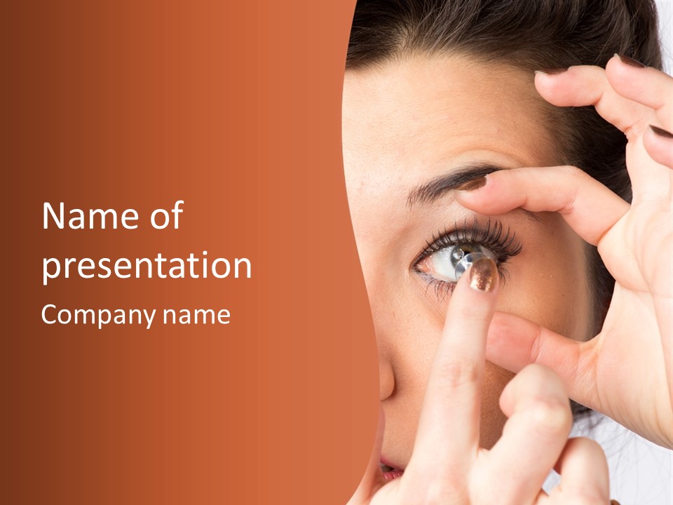 A Woman Putting A Contact Lens On Her Eye PowerPoint Template