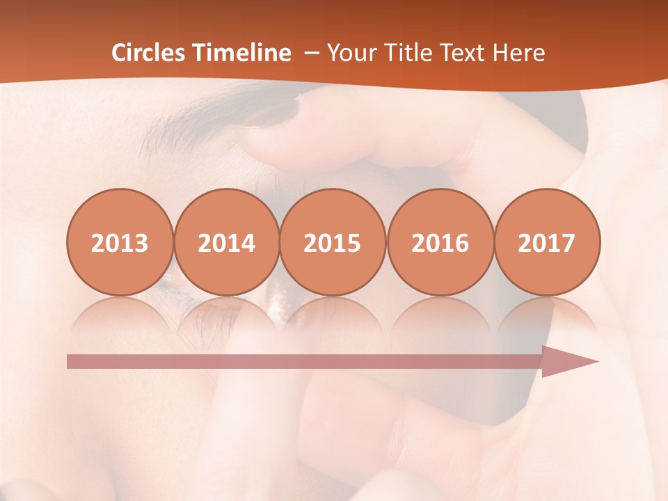 A Woman Putting A Contact Lens On Her Eye PowerPoint Template