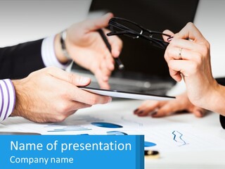 A Group Of People Sitting At A Table With A Tablet PowerPoint Template