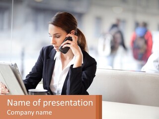 A Woman Talking On A Cell Phone While Using A Laptop PowerPoint Template
