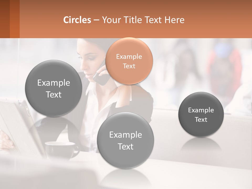 A Woman Talking On A Cell Phone While Using A Laptop PowerPoint Template