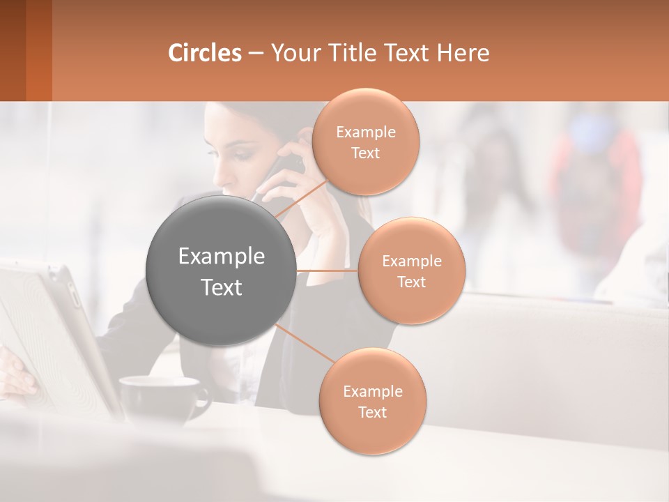 A Woman Talking On A Cell Phone While Using A Laptop PowerPoint Template