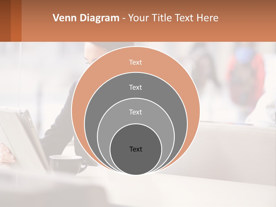A Woman Talking On A Cell Phone While Using A Laptop PowerPoint Template