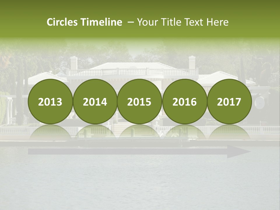 A Large White House Sitting Next To A Body Of Water PowerPoint Template