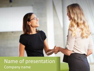 Two Women Shaking Hands In Front Of A Building PowerPoint Template