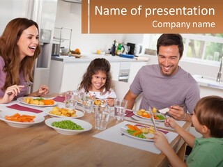 A Family Sitting Around A Table Eating A Meal PowerPoint Template