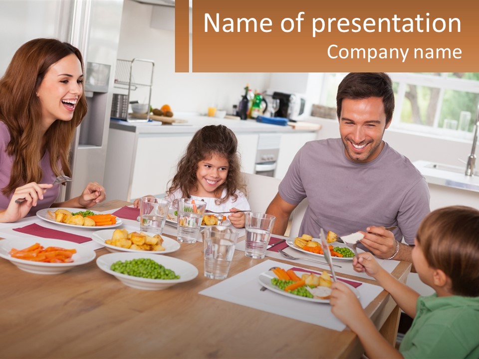 A Family Sitting Around A Table Eating A Meal PowerPoint Template