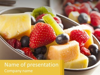 A Bowl Of Fruit Is Shown With The Name Of The Presentation PowerPoint Template
