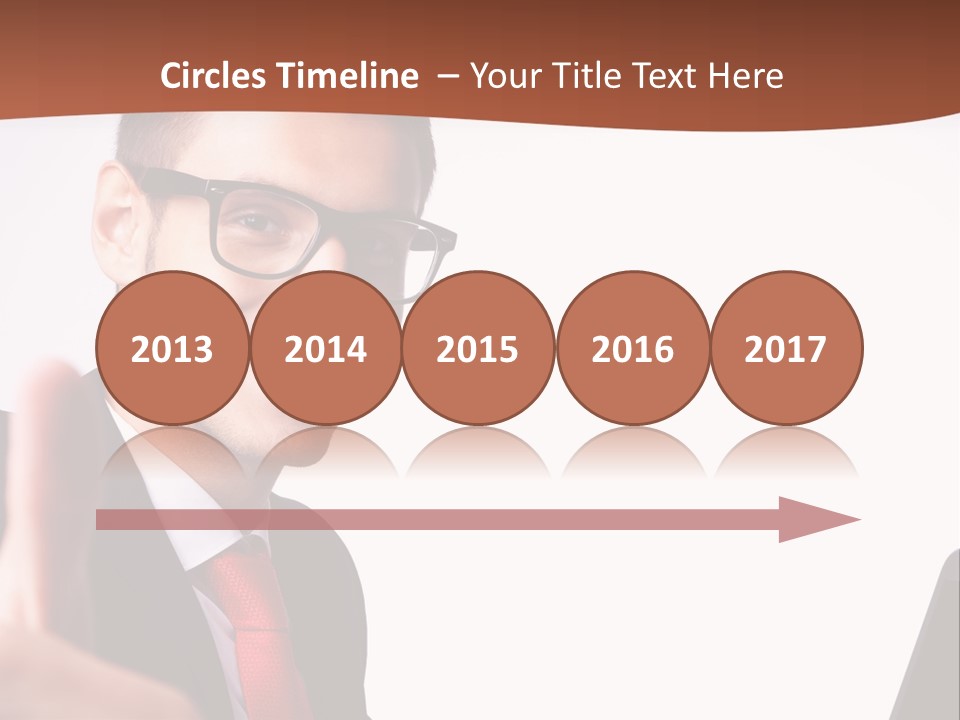 A Man In A Suit And Tie With A Laptop Giving A Thumbs Up PowerPoint Template