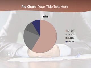 A Man In A Suit Sitting At A Table With His Hands Folded PowerPoint Template