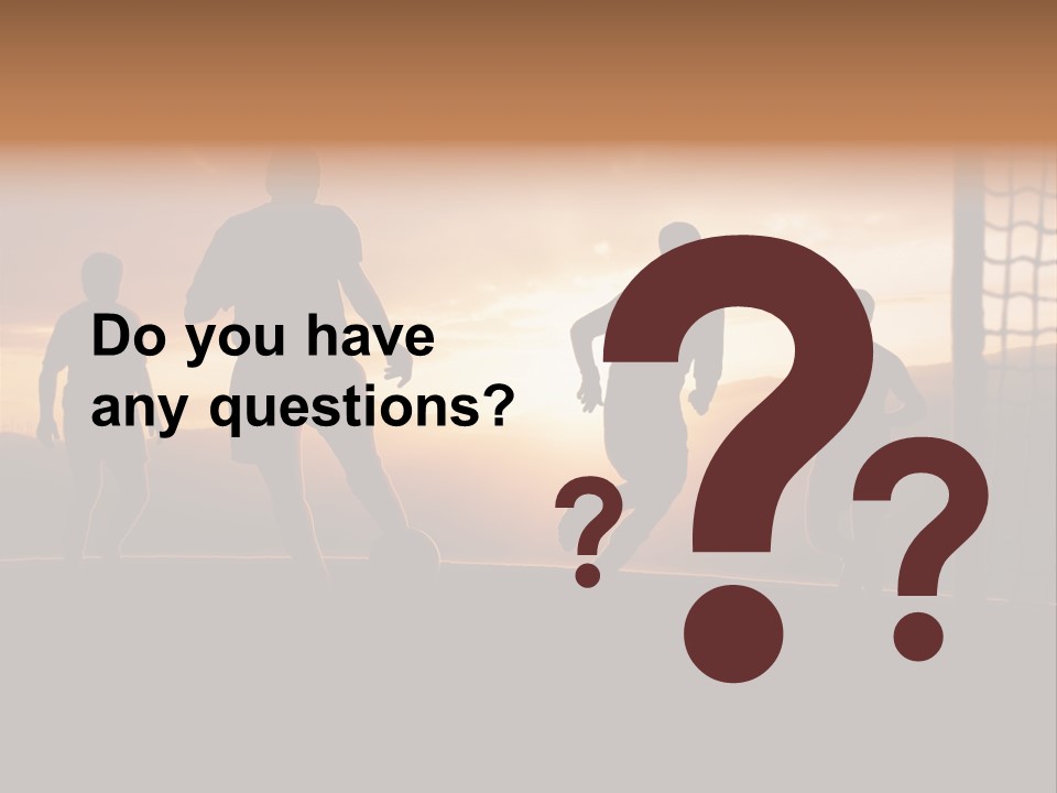 A Group Of People Playing Soccer At Sunset PowerPoint Template