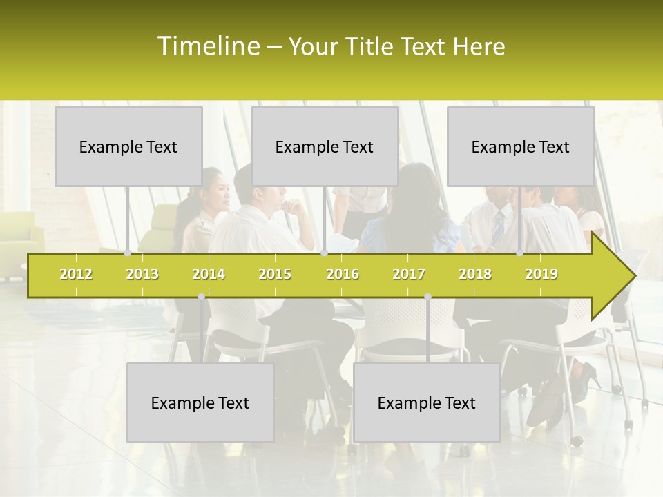 A Group Of People Sitting Around A Table Talking PowerPoint Template