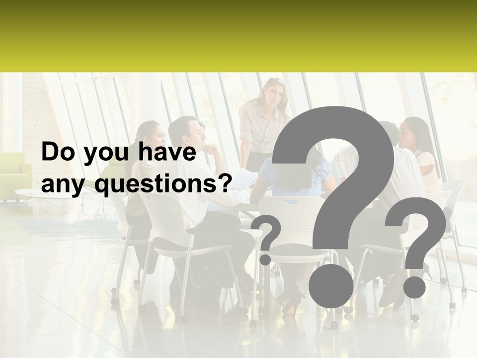 A Group Of People Sitting Around A Table Talking PowerPoint Template