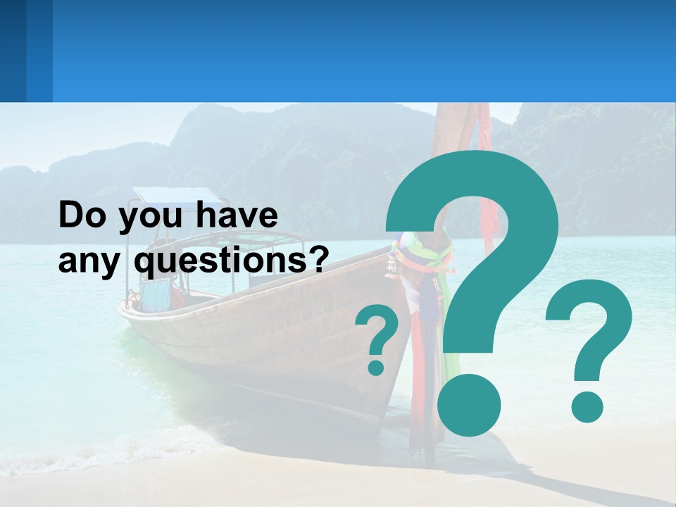 A Boat On The Beach With Mountains In The Background PowerPoint Template