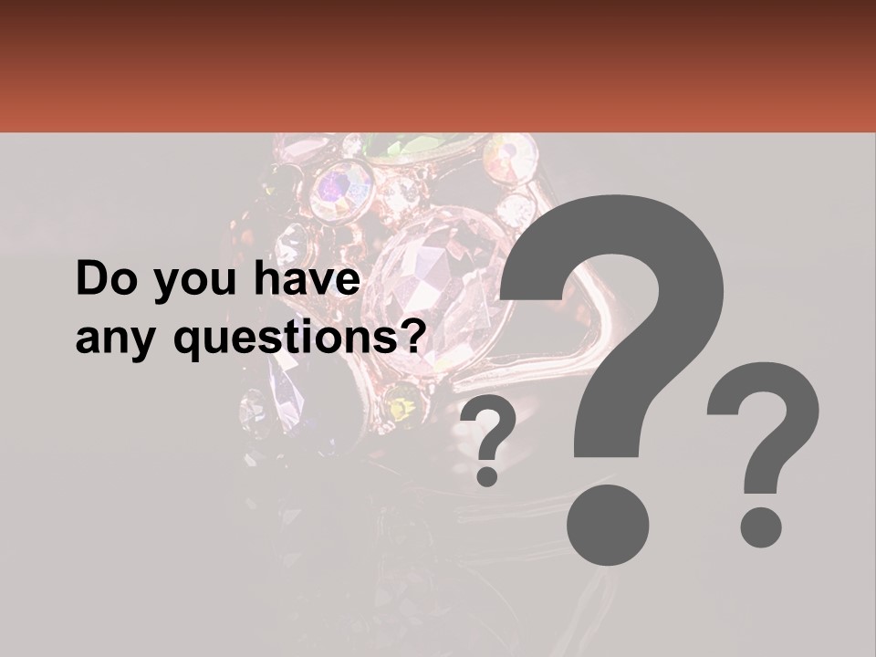 A Ring With A Bunch Of Different Colored Stones On It PowerPoint Template