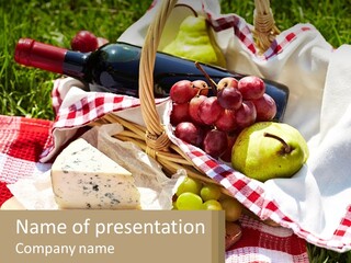 A Picnic Basket Filled With Fruit And Cheese PowerPoint Template