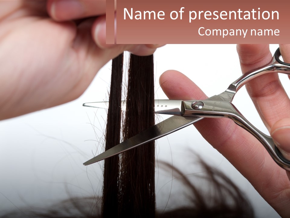 A Person Cutting A Piece Of Hair With A Pair Of Scissors PowerPoint Template