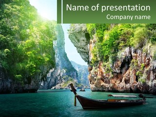 A Boat Floating On Top Of A Lake Next To A Mountain PowerPoint Template