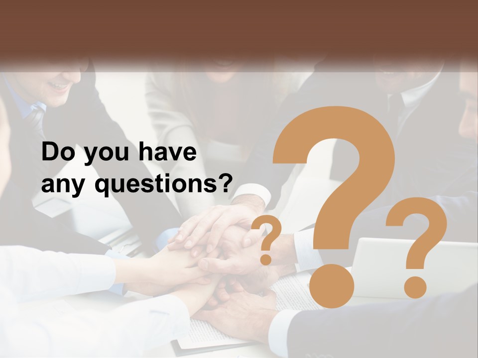 A Group Of Business People Putting Their Hands Together PowerPoint Template