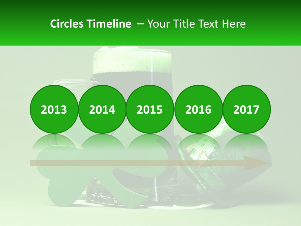 A Glass Of Beer With A Shamrock Next To It PowerPoint Template