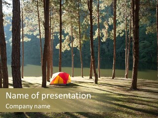 A Tent In The Woods With A Lake In The Background PowerPoint Template