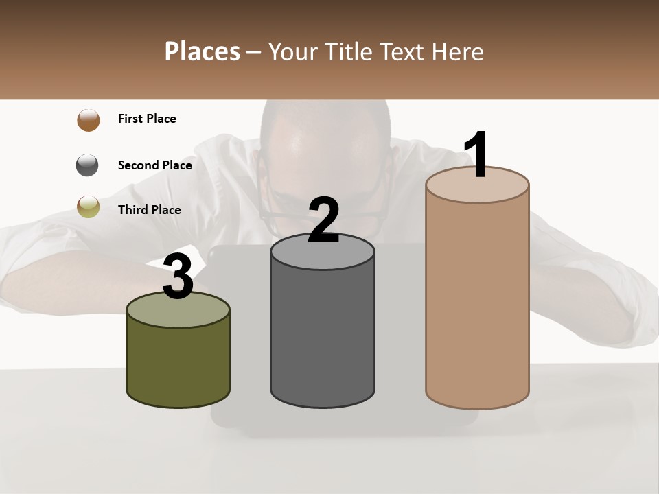 A Man Sitting In Front Of A Laptop Computer PowerPoint Template