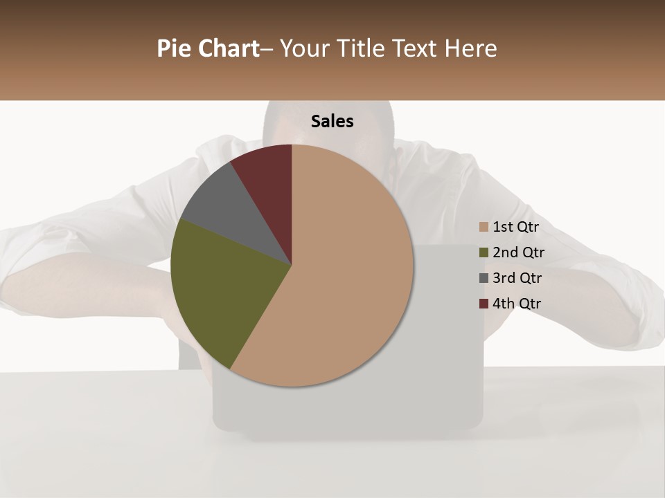 A Man Sitting In Front Of A Laptop Computer PowerPoint Template